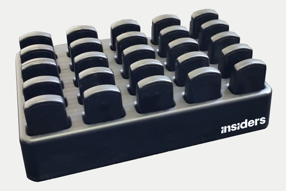 Omnisio Hub: a tray holding 25 Inspirit units in a five-by-five grid, with the manufacturer’s name on the front.